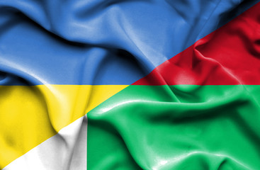 Waving flag of Madagascar and Ukraine
