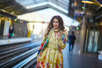 Woman waiting for a train