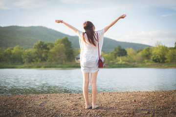 Obraz premium Outdoor portrait of a beautiful asian girl vintage and retro ton