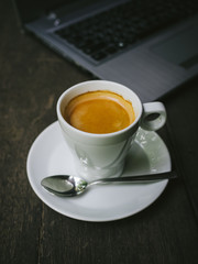 cup of coffee latte on the wood texture