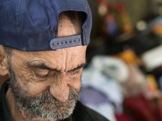 sad old homeless man