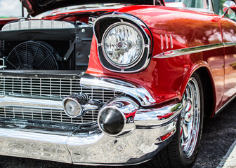 Obraz na płótnie Canvas Red classic car at a car show