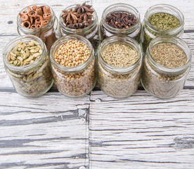 Hers and spices in mason jar