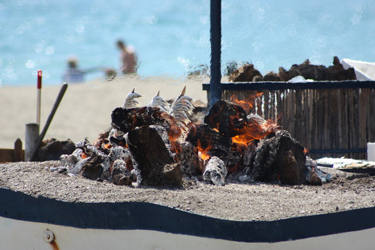 Espetos en el mar