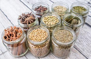 Hers and spices in mason jar