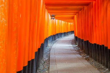 Fototapeten Thousands of vermilion torii gates at Kyoto Fushimi Inari Shrine © torsakarin