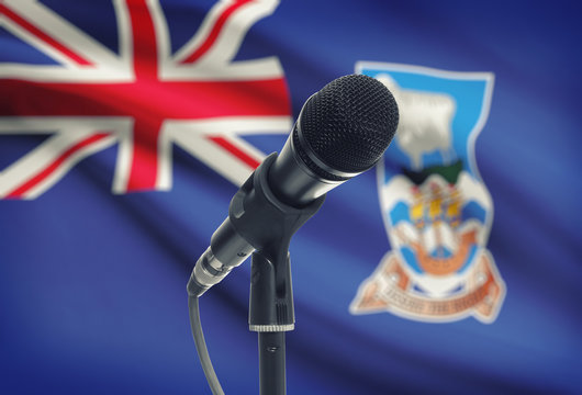 Microphone on stand with national flag on background - Falkland Islands