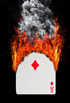 Playing card with fire and smoke