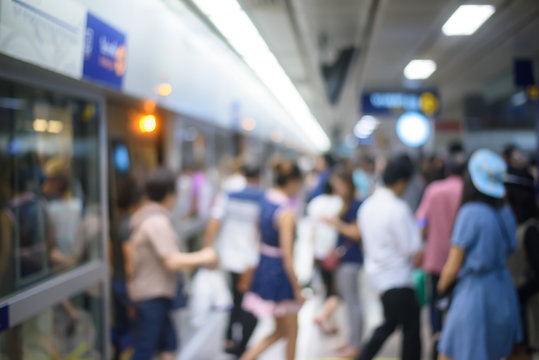 People on subway station blur motion