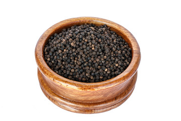 black pepper on wooden spoon with wooden plate isolated on white background.