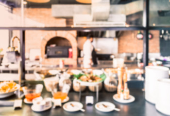 Blurred western kitchen with food preparing