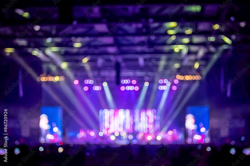 Poster blurred background : bokeh lighting in concert with audience ,mu