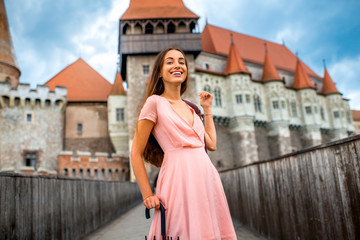 Female tourist near the Corvin castle