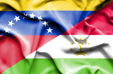 Waving flag of Tajikistan and Venezuela
