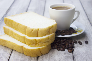 bread and soft focus coffee