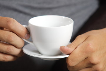 cup of coffee in the hands