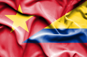 Waving flag of Columbia and Vietnam