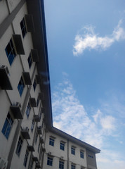 Building with windows in blue sky