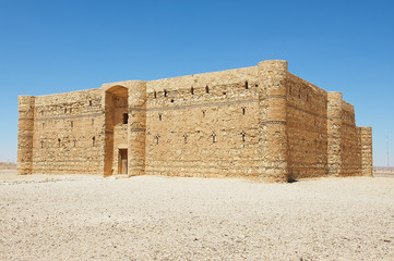 Exterior of the desert castle Qasr Kharana (Kharanah or Harrana) near Amman, Jordan. Built in 8th century, used as caravanserai.