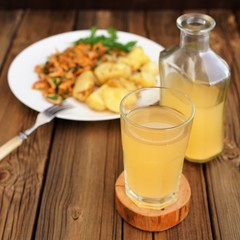 Kvass - cold Russian beverage of rye bread - in glass and bottle