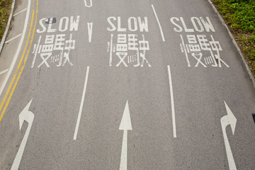Bilingual (English and Chinese) Slow road sign for driver