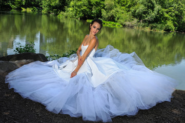 Model Kalyn Hemphill poses by the lake in Central Park at the Irina Shabayeva SS 2016 Bridal...