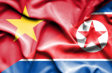 Waving flag of North Korea and Vietnam