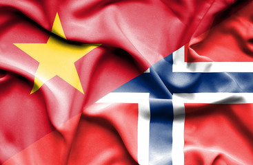 Waving flag of Norway and Vietnam