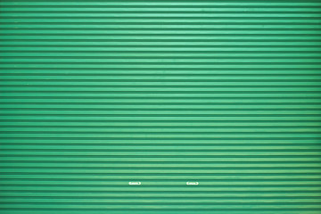 Obraz premium Close-up detail of closed metal security shutter
