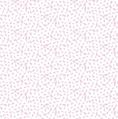 Vector seamless background consisting of random drops scattered in different directions. Chaotic drops on a white background.