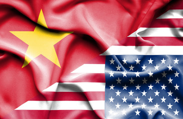 Fototapeta premium Waving flag of United States of America and Vietnam