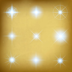 Creative concept Vector set of glow light effect stars bursts