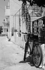 bike in front of the house on the street in Greece