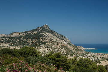 Fototapeta na wymiar Mountain lagoon and sea with ships in Greece