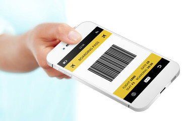 hand holding mobile phone with boarding pass isolated over white