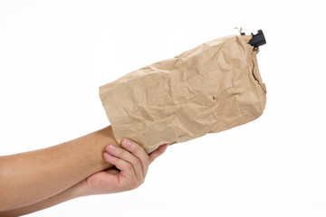 gun in paper bag