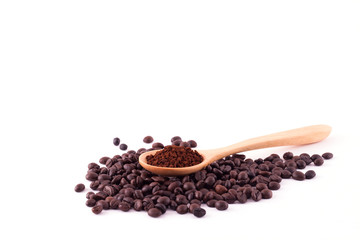 Coffee beans and ground coffee on wooden spoon isolated on white