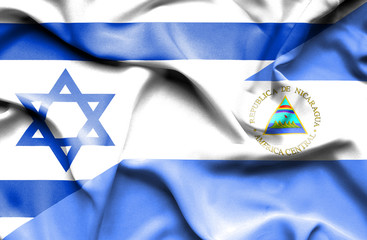 Waving flag of Nicaragua and Israel