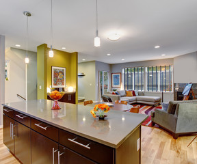 Retro kitchen with modern twist along with hardwood floor.