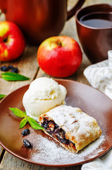 Apple strudel with nuts and raisins