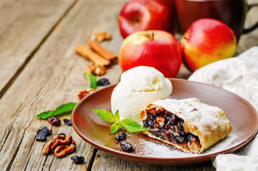 Apple strudel with nuts and raisins