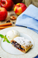 Apple strudel with nuts and raisins