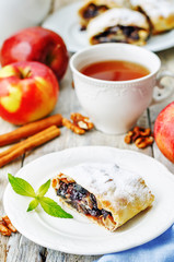 Apple strudel with nuts and raisins