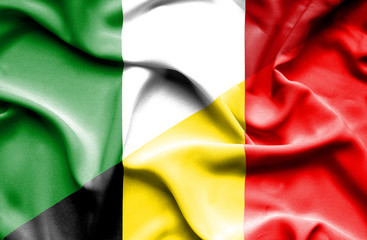 Waving flag of Belgium and Italy