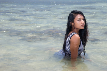 Young woman in the sea