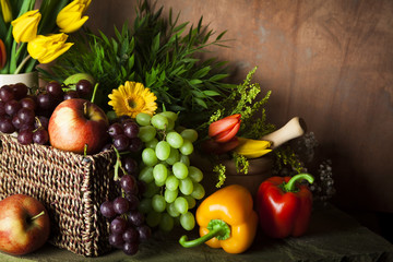 Traditional basket of harvested fruit and vegetables
