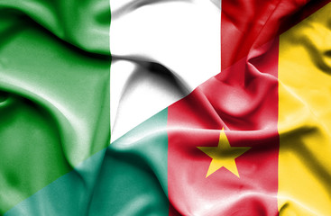 Waving flag of Cameroon and Italy