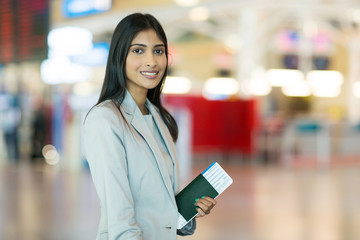 indian female business traveller at airport