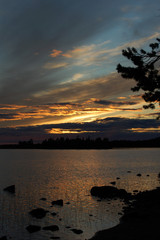 Sunset on the lake. White nights in Karelia, Russia. 