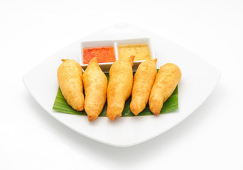 Tiger prawns fried in dough isolated on white.
